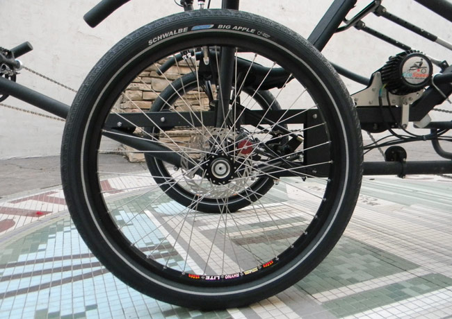  - The first step to getting the height was to build up some custom 24-inch wheels equipped with Schwalbe Big Apple 2.35 tires all the way around.