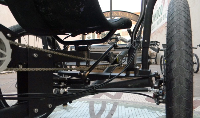  - The connection point on the steering linkage can be rotated to set the neutral position of the handlebars.