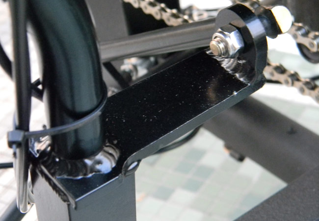  - The arm on the handlebar pivot puts the linkage tierod into the proper position.