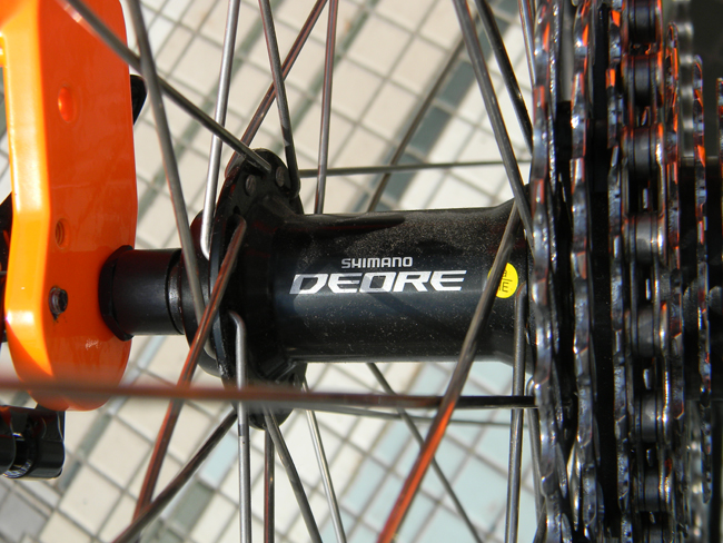 Shimano Deore - This trike also features the Shimano Deore hubs and cassette sprockets. The deore parts shimano's high performance line for all trikes.