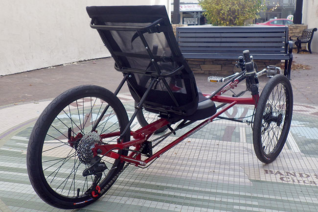 - The triangulated rear of the trike is strong and will allow for up to a 24-inch wheel. Floating idlers are standard as are the Kenda Kwest tires.