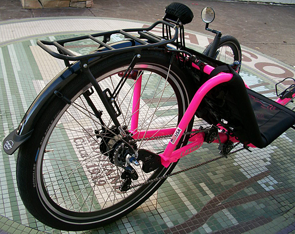 Accessories - This trike has an Axiom Disc rack installed to provide the possibility to carry alot of cargo. The trike also has a rear fender installed to prevent the rider from getting a skunk stripe down their back if the roads are wet or muddy. The owner also wanted a headrest to be able to kick back and relax her head on those long rides. She also has a CatEye tail light installed to be more visible to drivers.