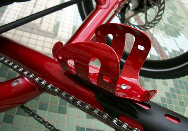 Water Bottle Cage - The water bottle cage installed on this trike is TerraCycle's Cat Cage in red. The color of the cage matched perfectly with the candy red paint job.