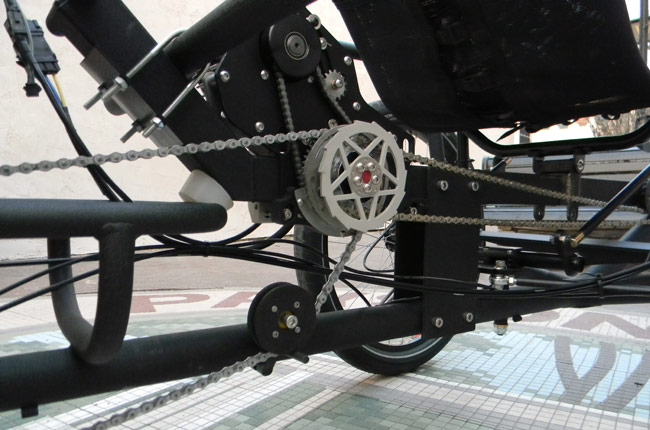  - The Ecospeed is a middrive electric drive. It is mounted in front of the Alfine transmission to provide maximum power to the rear wheels. The lower idler position is slid forward to adjust the chain tension.