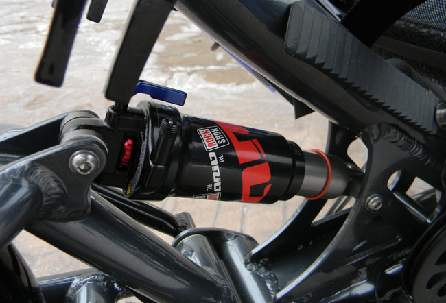  - The rear suspension features the ARIO air shock by Rock Shox. This shock has lockout for climbing hills, and the shock is completely adjustable.