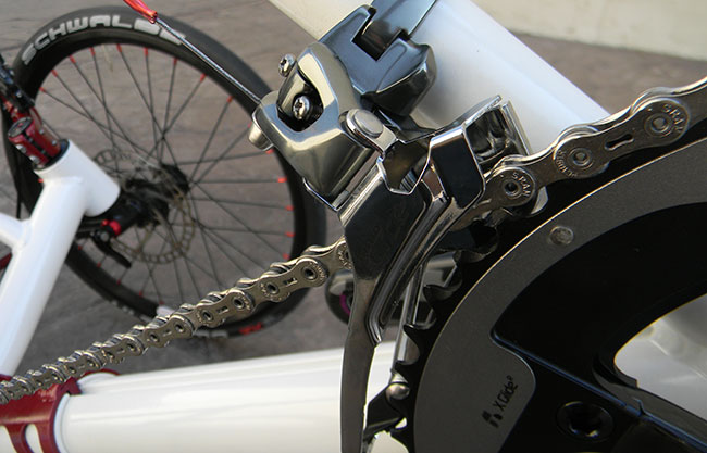  - The SRAM Force derailleur was used in the front because there is no compatible Red derailleur that will work with the Catrike derailleur post. The shifting is so perfect that it matches the precision of the rear derailleur.