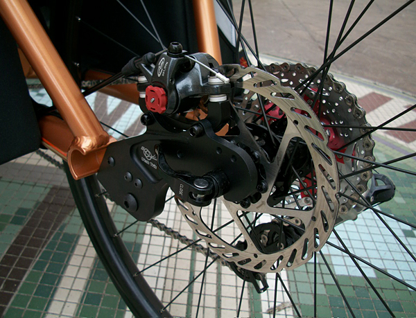 Rear Brake - One thing I discovered when I was running the huge 29er tire was that I needed some extra braking power to stop the trike. Even though I went with the slightly smaller tire I left the brake on there for use as a parking brake. Pictured is the Avid BB7 and the Cleansweep rotor.